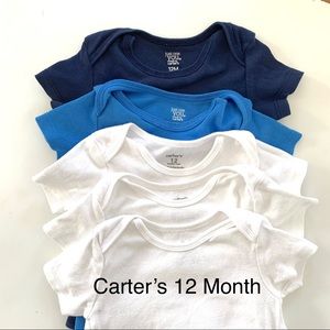Set of Carter’s solid onesies
